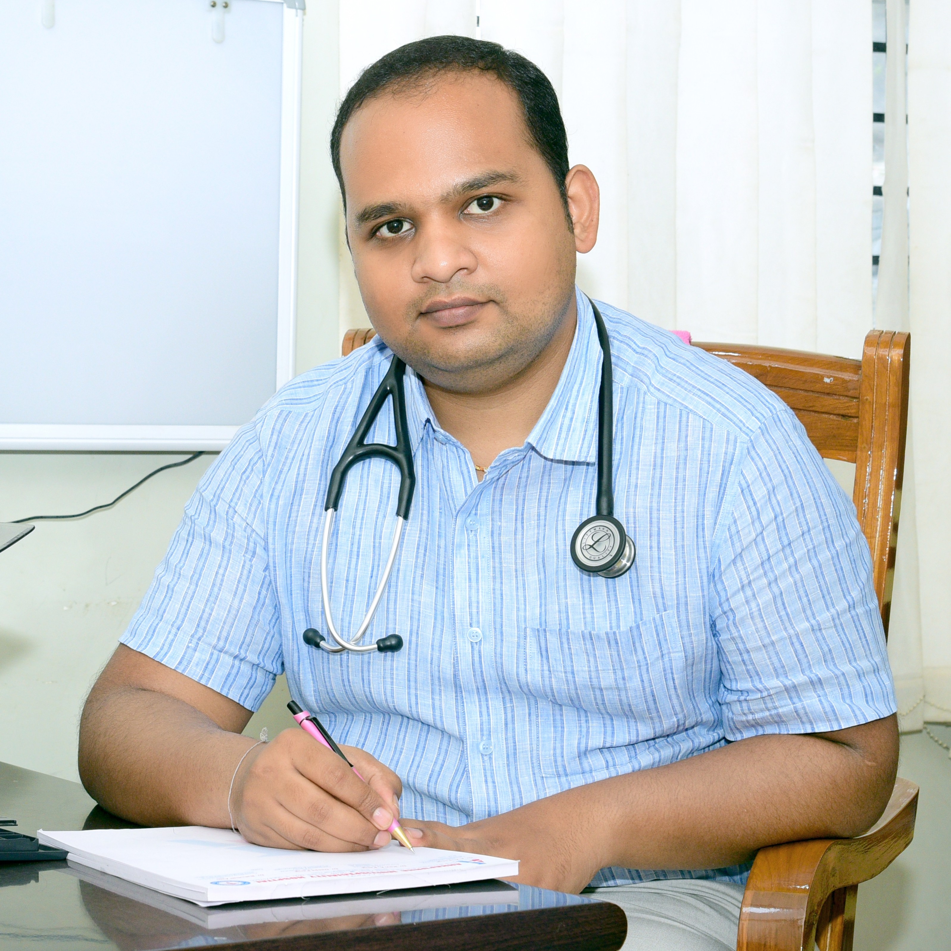Dr. Ravi Pangi